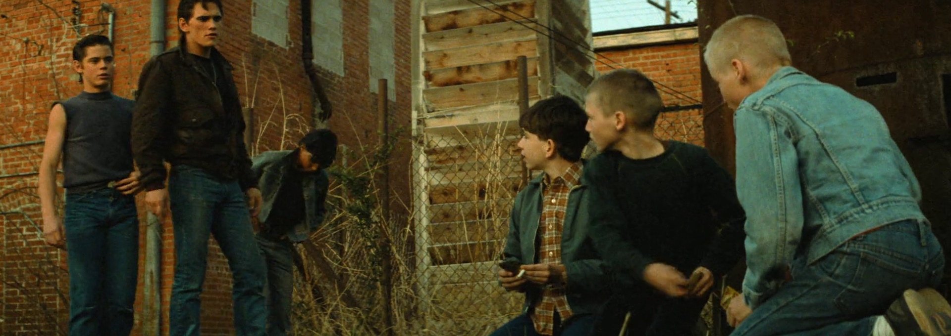 Beskrivende bilde relatert til innholdet i filmen "The Outsiders"