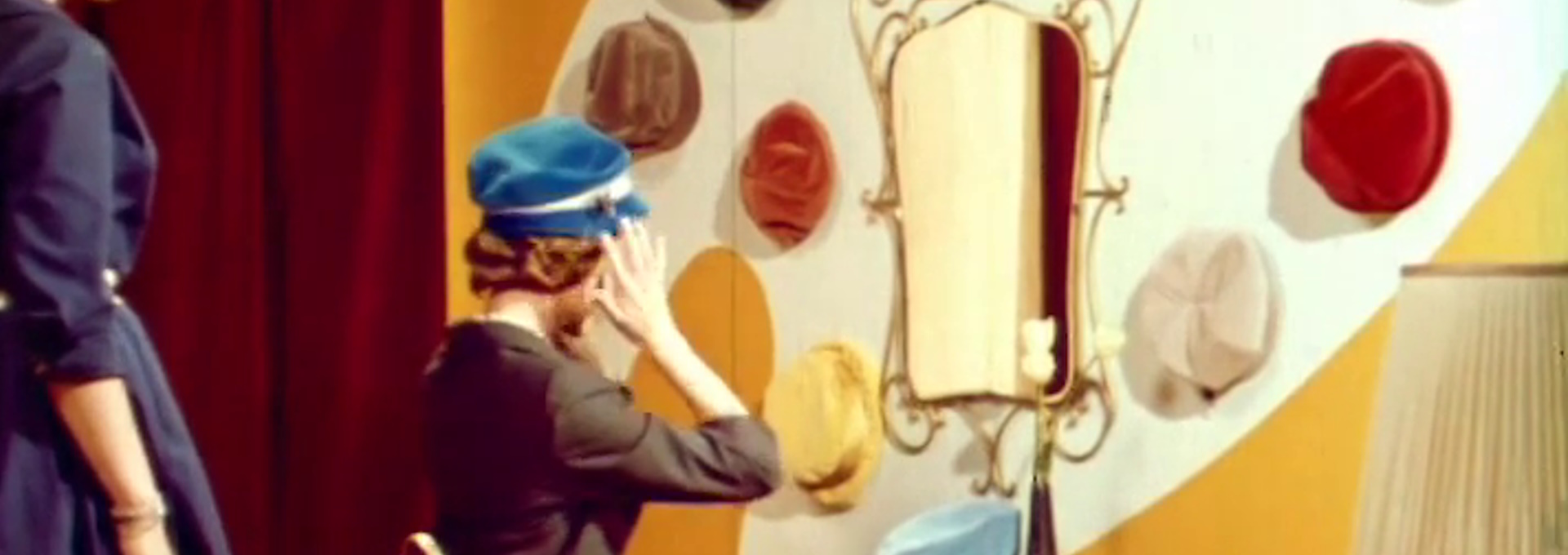 Beskrivende bilde relatert til innholdet i filmen "Kysemerket : damehatter"
